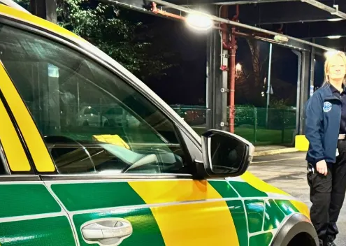 Two community responders return to their response vehicle. The Big Give is supporting their work